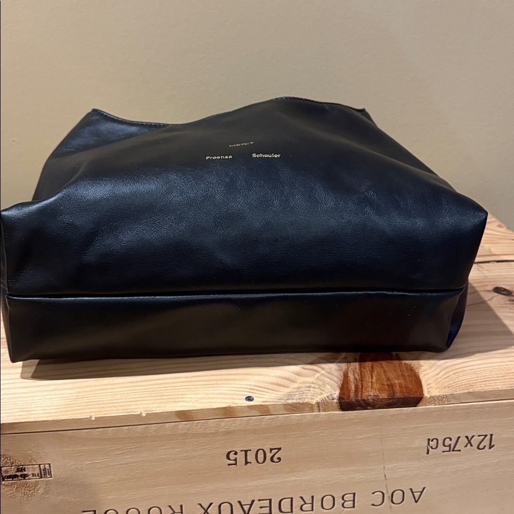 Merit x Proenza Schouler Reversible Vegan Knot Tie Clutch Black Light Blue - Picture 7 of 10